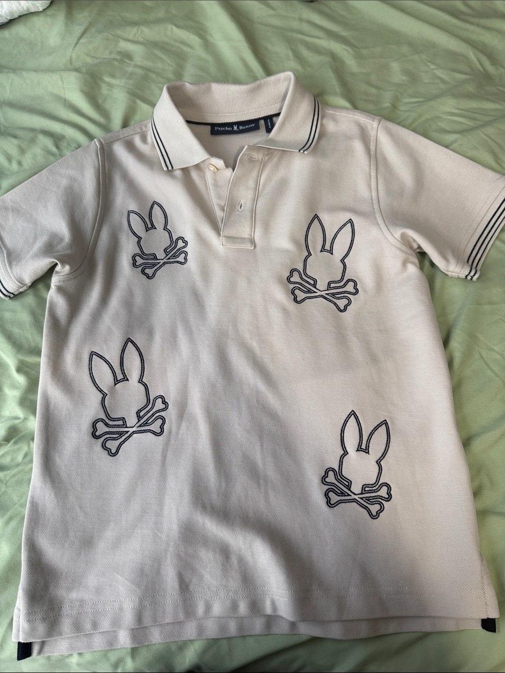 Psycho Bunny White Polo with Navy Bunny Skull Embroidery